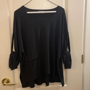 Sympli black top with rolled sleeves and pocket accent, Size 10.